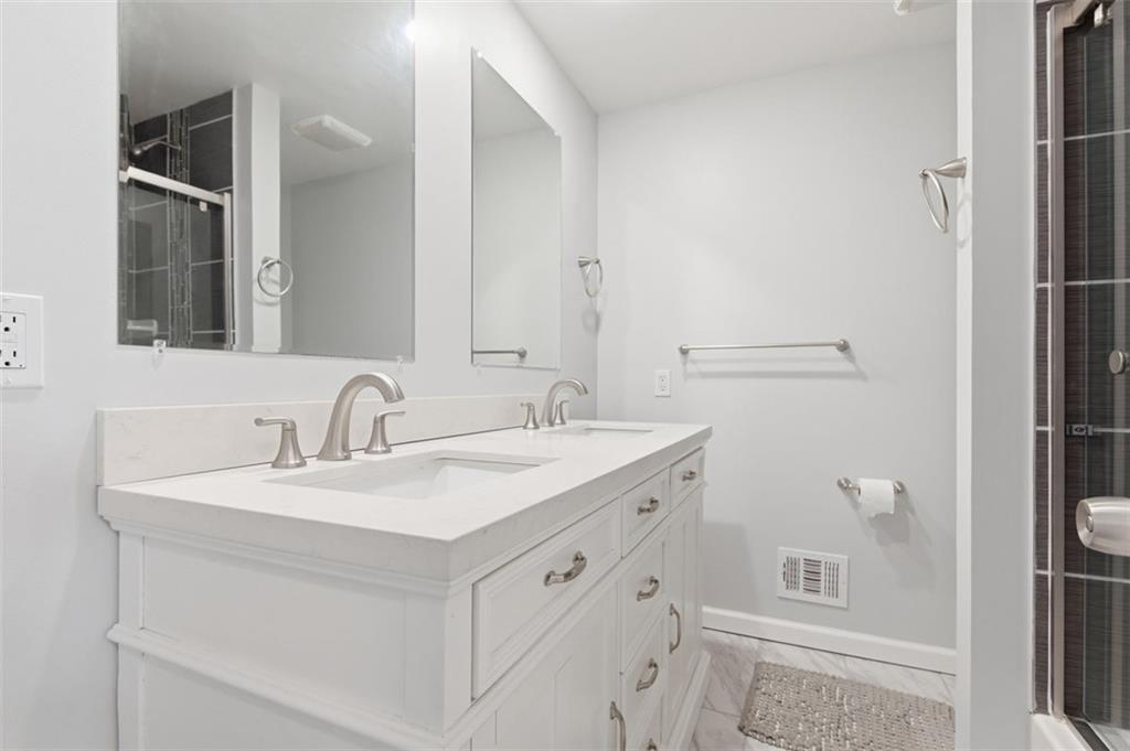 3106 Greenfield Road Glenshaw, PA 15116 - Photo 19 of 47 a bathroom with a sink and a mirror