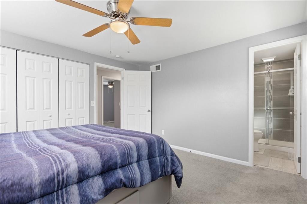 3106 Greenfield Road Glenshaw, PA 15116 - Photo 24 of 47 a bedroom with a bed and a ceiling fan