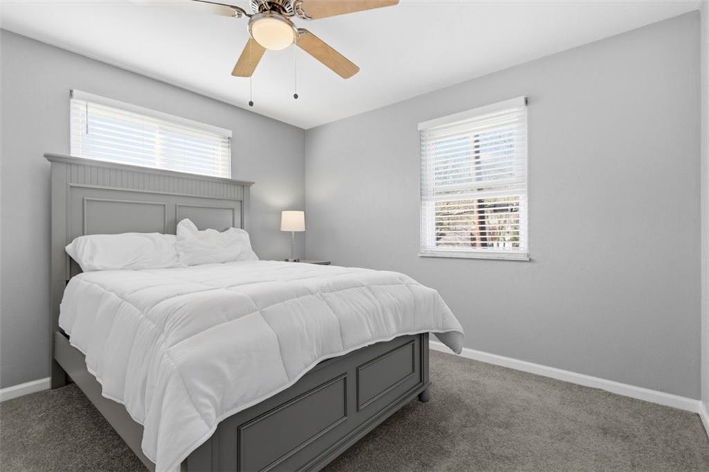 3106 Greenfield Road Glenshaw, PA 15116 - Photo 29 of 47 a bedroom with a bed and a chandelier