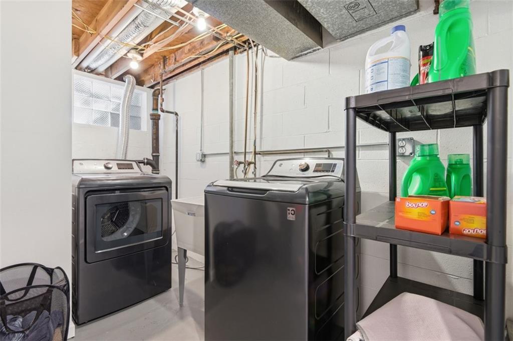 3106 Greenfield Road Glenshaw, PA 15116 - Photo 39 of 47 a view of a kitchen with a sink and a stove