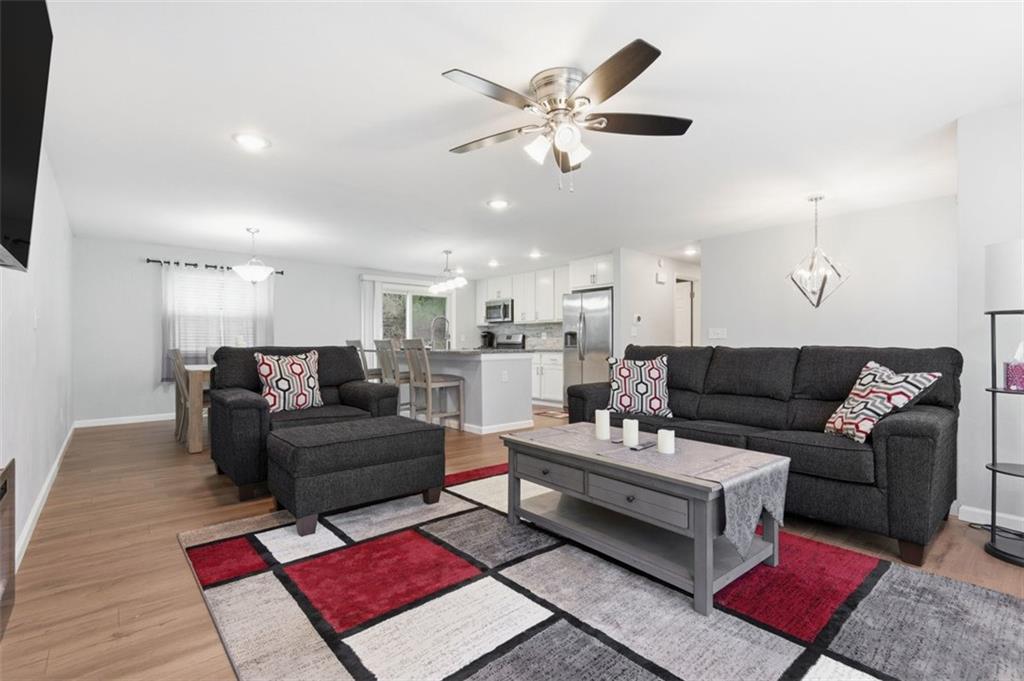3106 Greenfield Road Glenshaw, PA 15116 - Photo 6 of 47 a living room with furniture and a rug