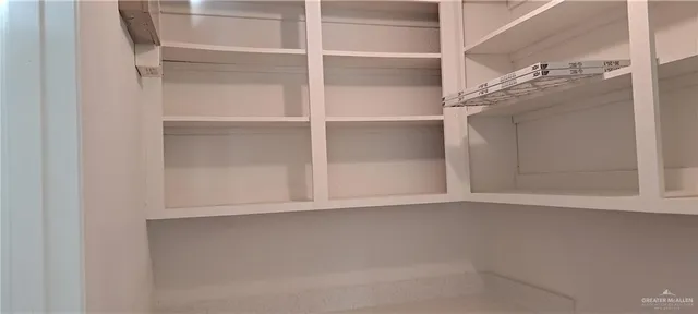 a view of a bathroom from a hallway