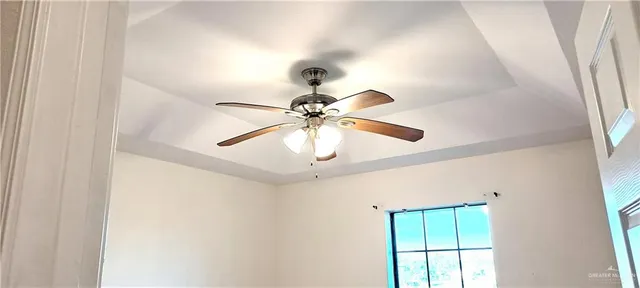 a bathroom with a close shower view