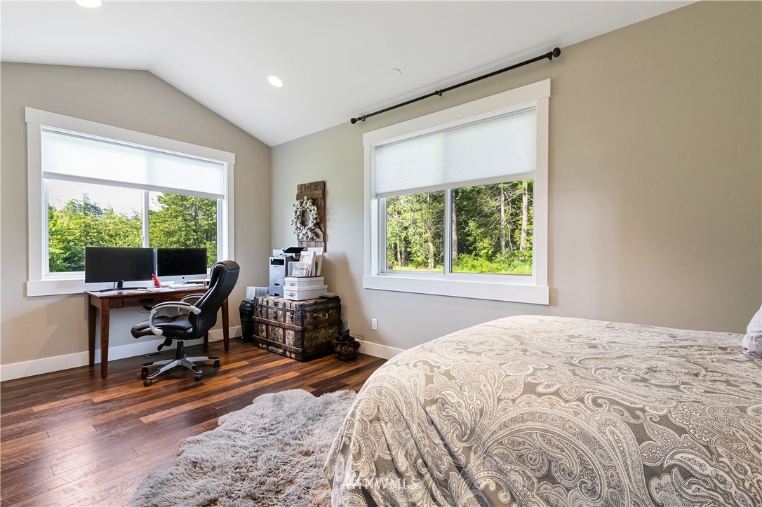 278 Beard Road Lynden, WA 98264 - Photo 22 of 35 a bedroom with a bed and a large window