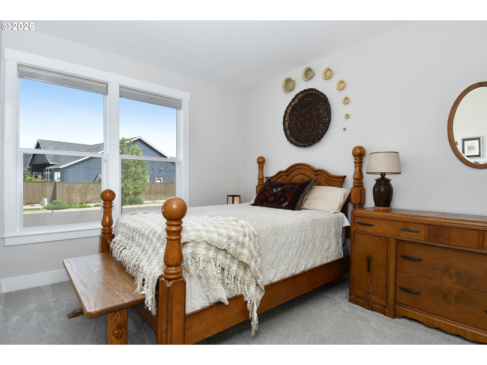 1927 South Fir Loop Canby, OR 97013 - Photo 19 of 35 a bedroom with a bed and window