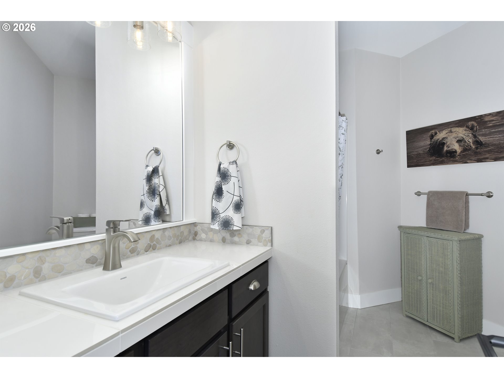 1927 South Fir Loop Canby, OR 97013 - Photo 24 of 35 a bathroom with a sink and a mirror