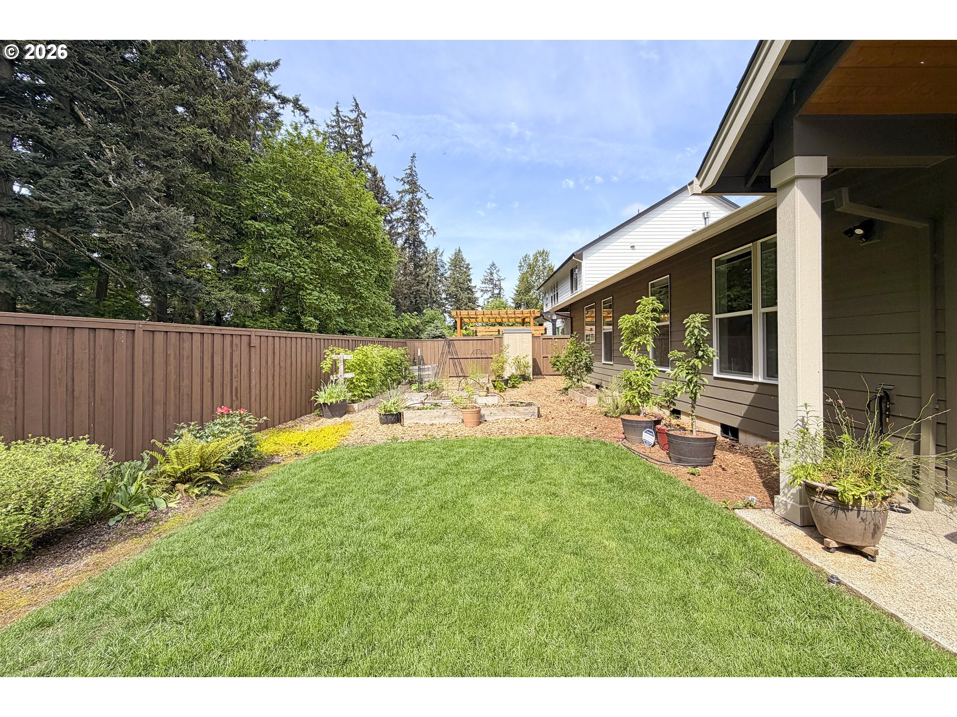 1927 South Fir Loop Canby, OR 97013 - Photo 30 of 35 a view of backyard with outdoor seating and green space