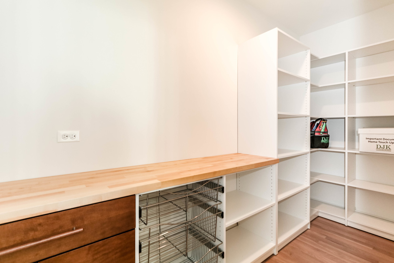 27-w151 48th Street Naperville, IL 60563 - Photo 11 of 25 a view of walk in closet with empty racks