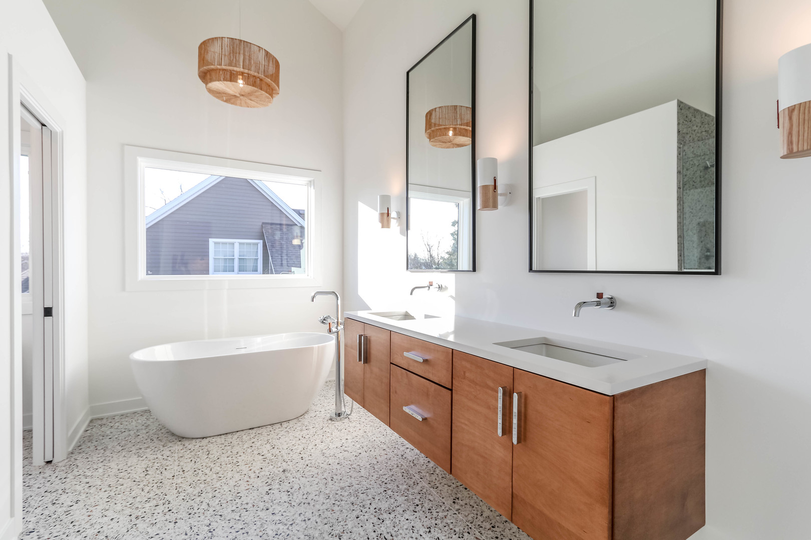 27-w151 48th Street Naperville, IL 60563 - Photo 19 of 25 a bathroom with a tub sink and mirror