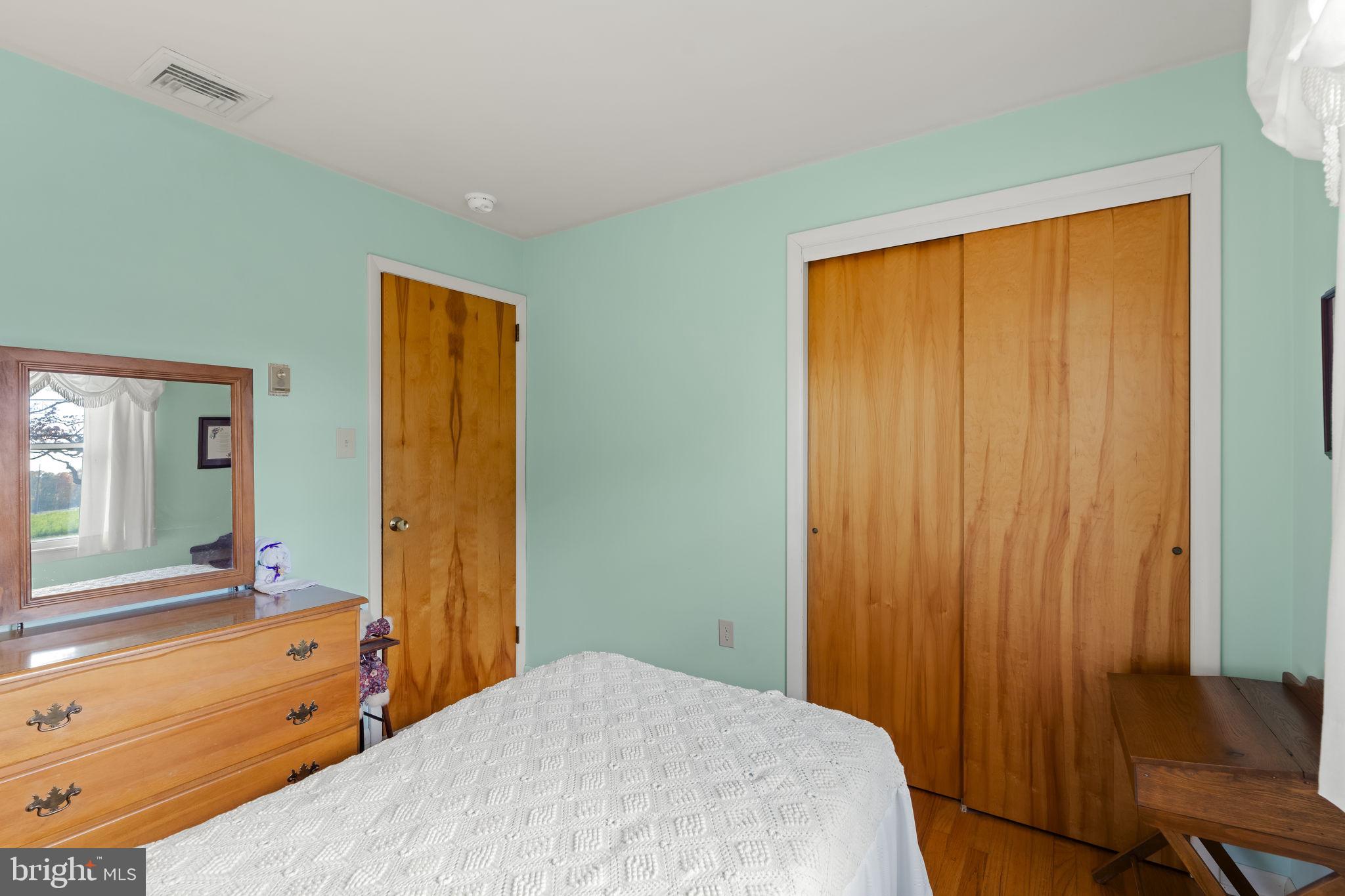 337 Long Road Manheim, PA 17545 - Photo 16 of 50 a bedroom with a bed and a dresser