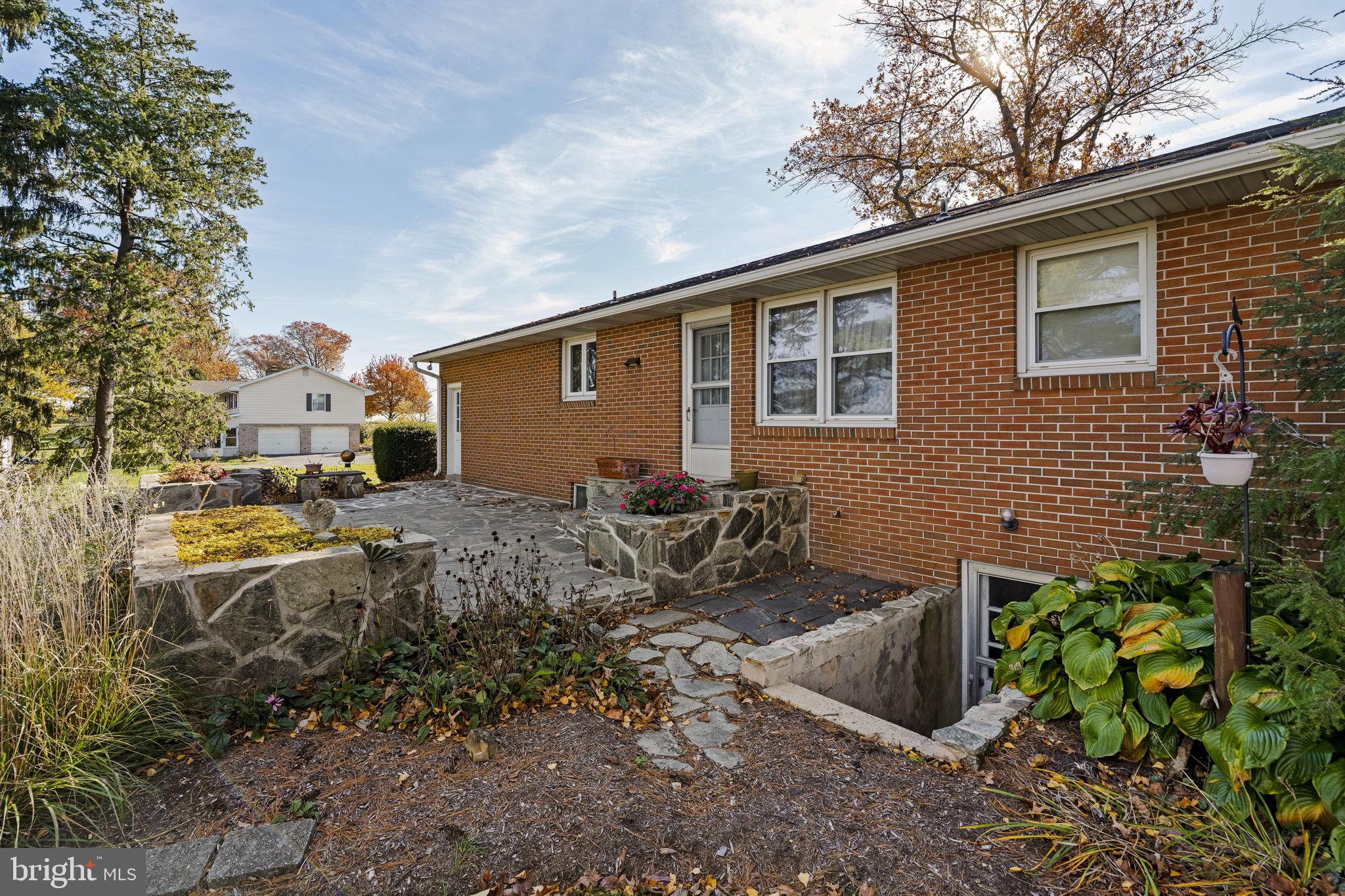 337 Long Road Manheim, PA 17545 - Photo 45 of 50 a backyard of a house with yard and outdoor seating