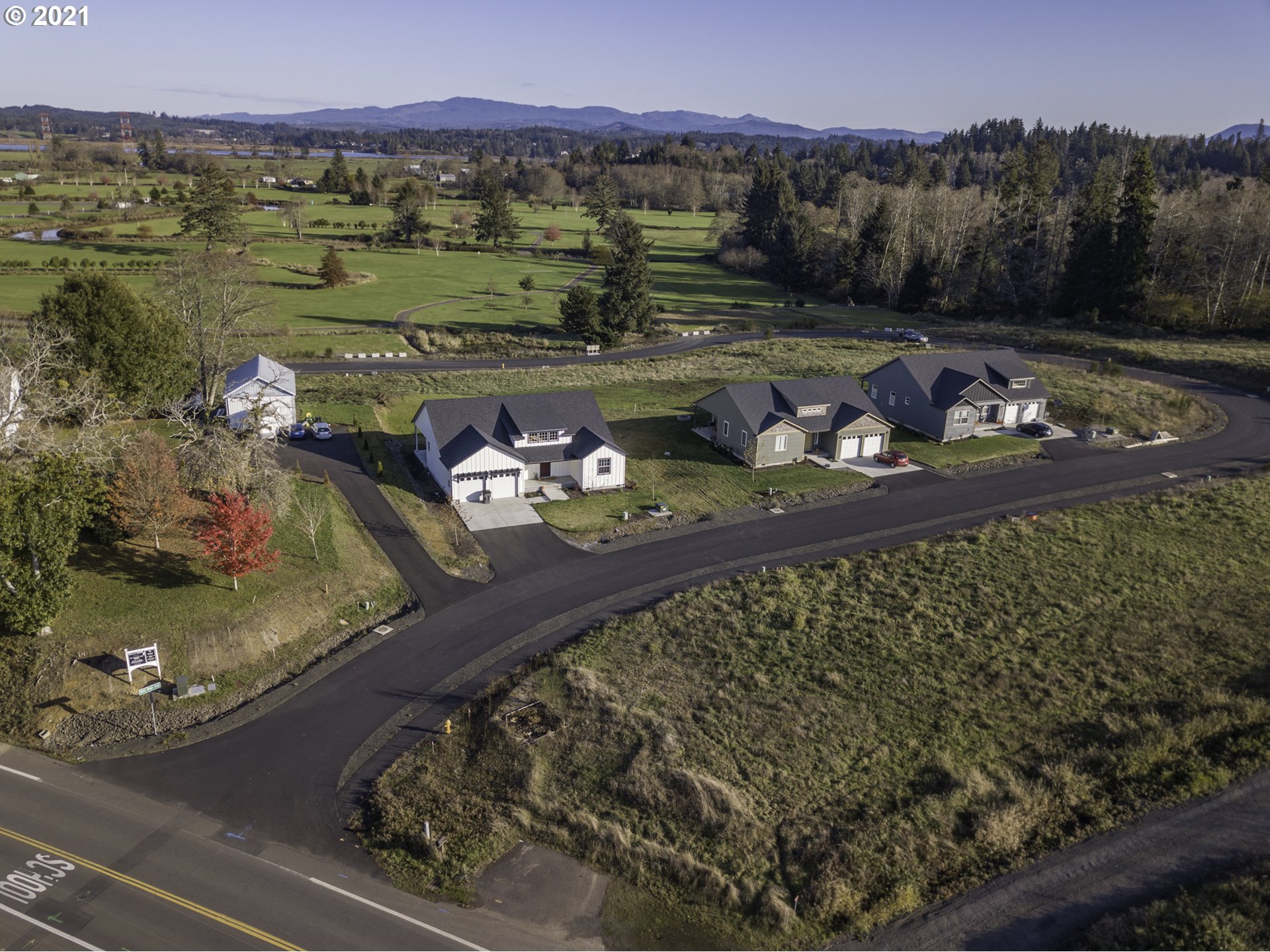 26 Bella Ridge Road Astoria, OR 97103 - Photo 2 of 4 a view of a lake with a mountain in the background
