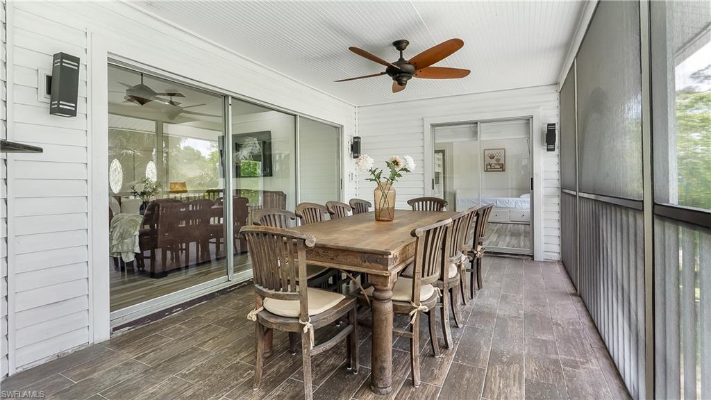 2920 24th Avenue Southeast Naples, FL 34117 - Photo 18 of 50 a view of a dining room with furniture and window
