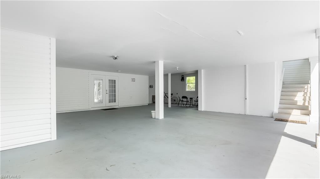 2920 24th Avenue Southeast Naples, FL 34117 - Photo 26 of 50 an empty room with windows