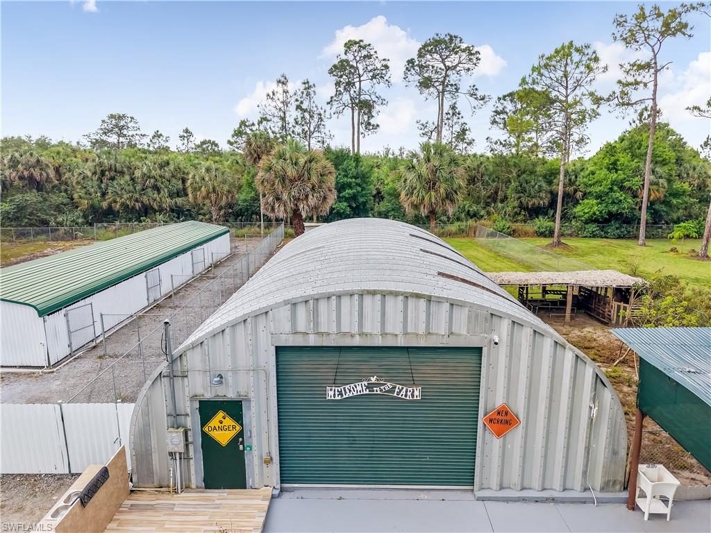 2920 24th Avenue Southeast Naples, FL 34117 - Photo 42 of 50 a view of outdoor space and yard