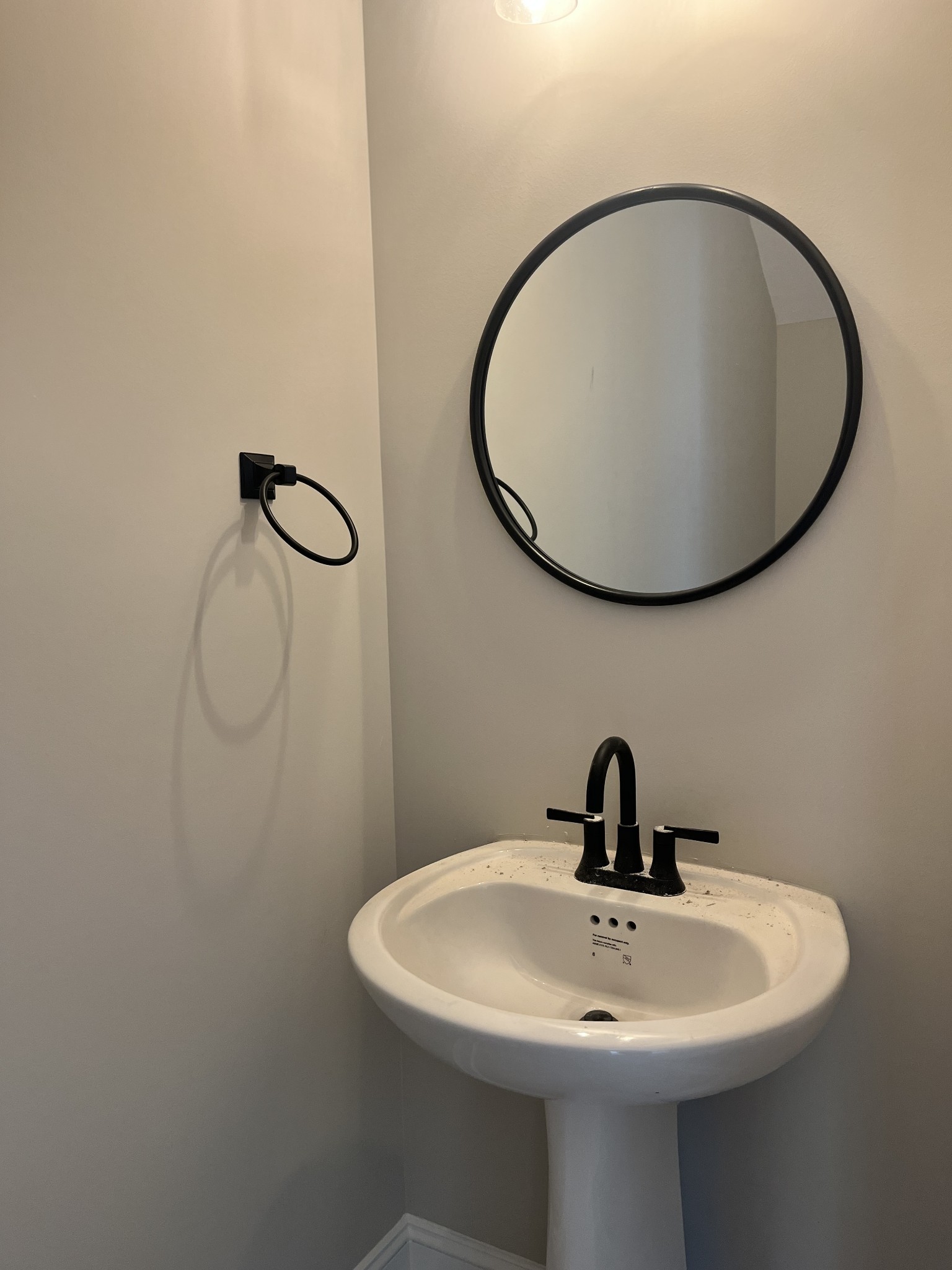 48 Cave Springs Road, Unit LOT 4 Clarksville, TN 37042 - Photo 5 of 12 a bathroom with a sink and mirror