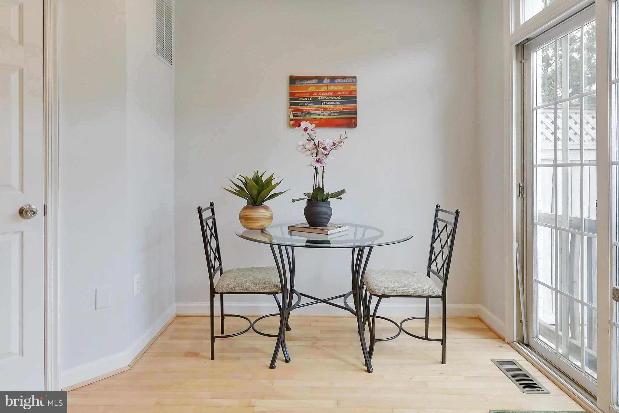 807 Capitol Square Place Southwest Washington, DC 20024 - Photo 14 of 30 a view of a dining room with furniture and wooden floor