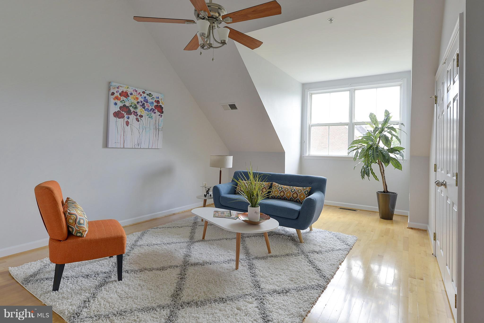 807 Capitol Square Place Southwest Washington, DC 20024 - Photo 21 of 30 a living room with furniture and a potted plant