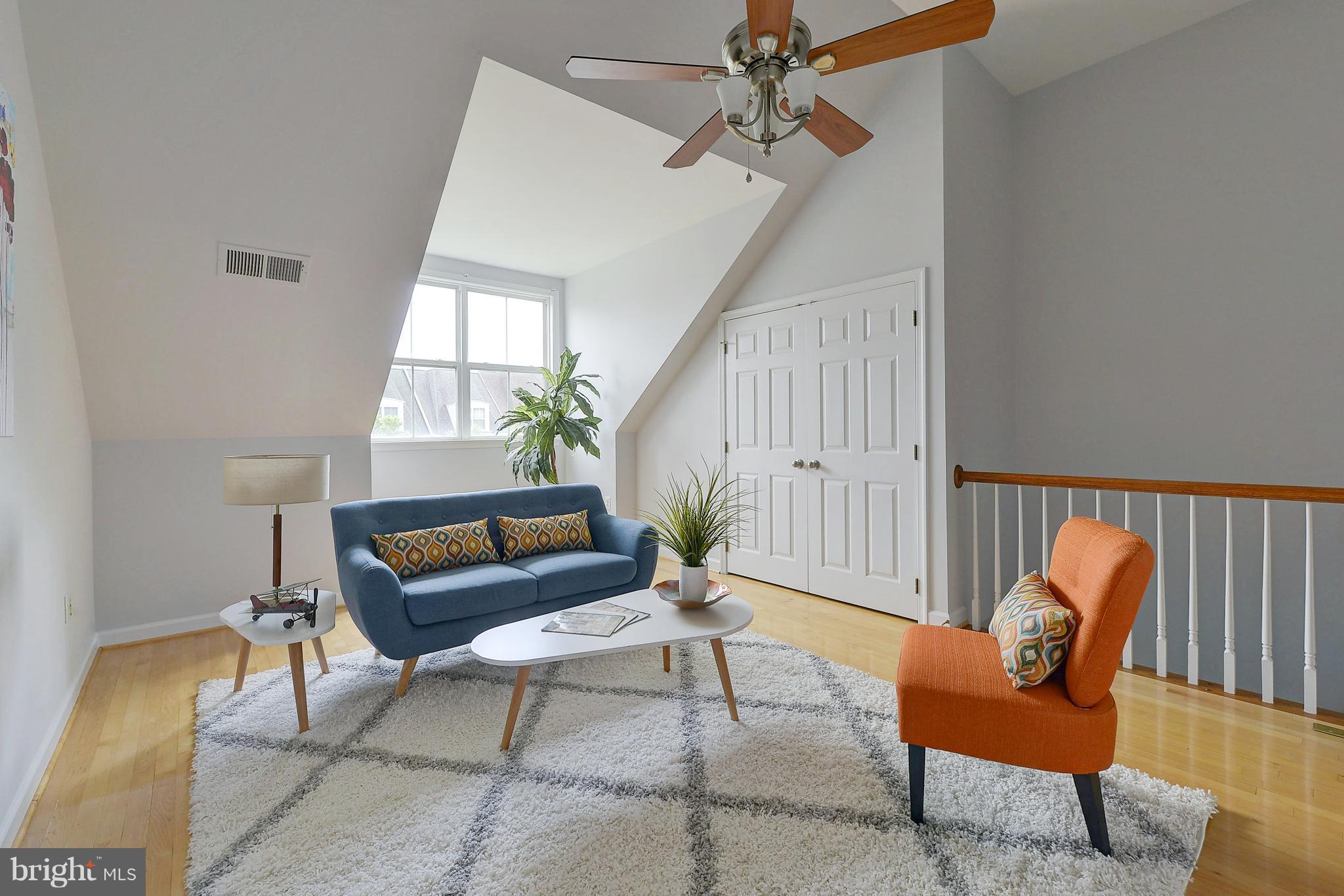 807 Capitol Square Place Southwest Washington, DC 20024 - Photo 22 of 30 a living room with furniture and a potted plant