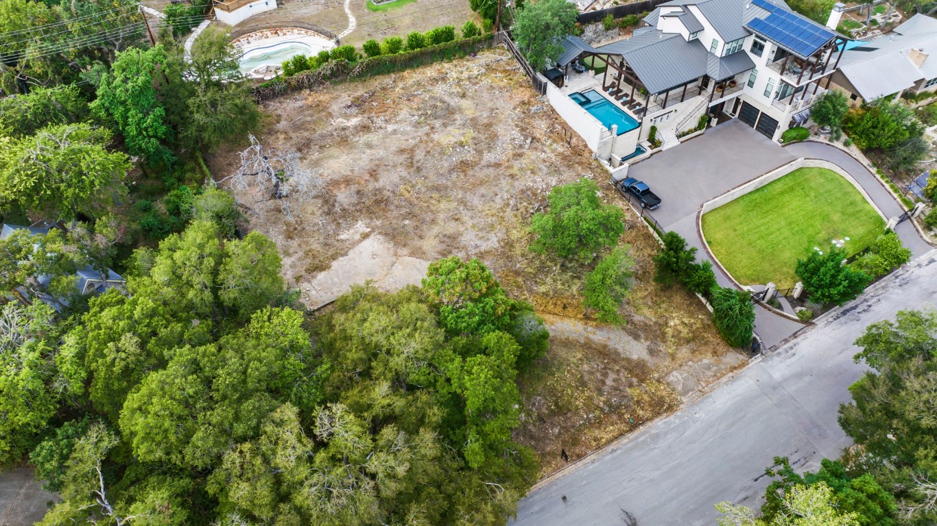 Undisclosed Address Austin, TX 78746 - Photo 1 of 15 an aerial view of residential house with outdoor space