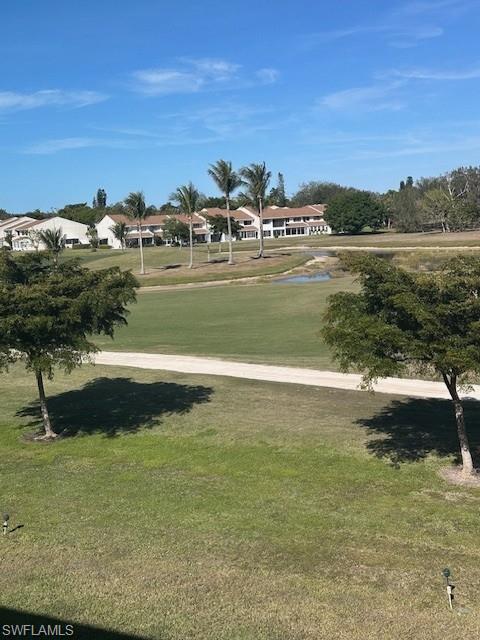 315 St Andrews Boulevard, Unit D37 Naples, FL 34113 - Photo 25 of 31 a view of lake view and mountain