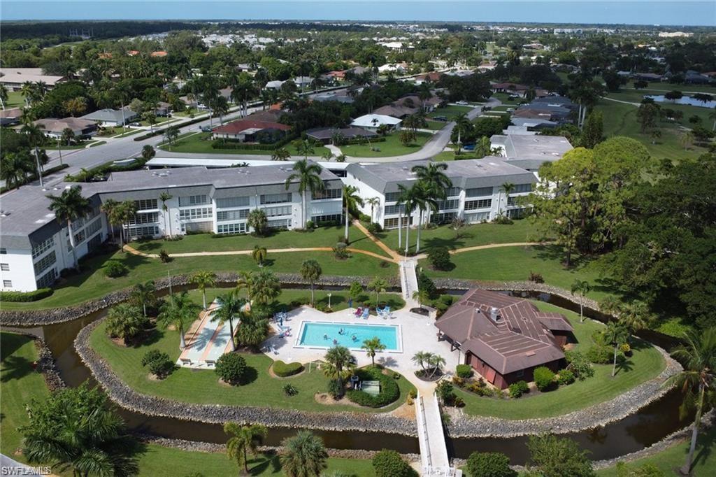 315 St Andrews Boulevard, Unit D37 Naples, FL 34113 - Photo 31 of 31 an aerial view of a house with a garden