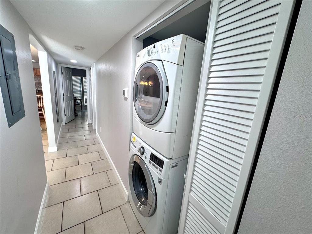 3473 Clark Road, Unit 171 Sarasota, FL 34231 - Photo 12 of 22 a utility room with dryer and washer