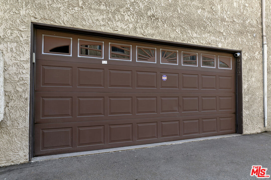 9772 Vía Roma Burbank, CA 91504 - Photo 37 of 44 a front view of a house with a garage