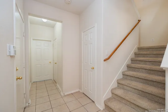 a view of entryway with stairs