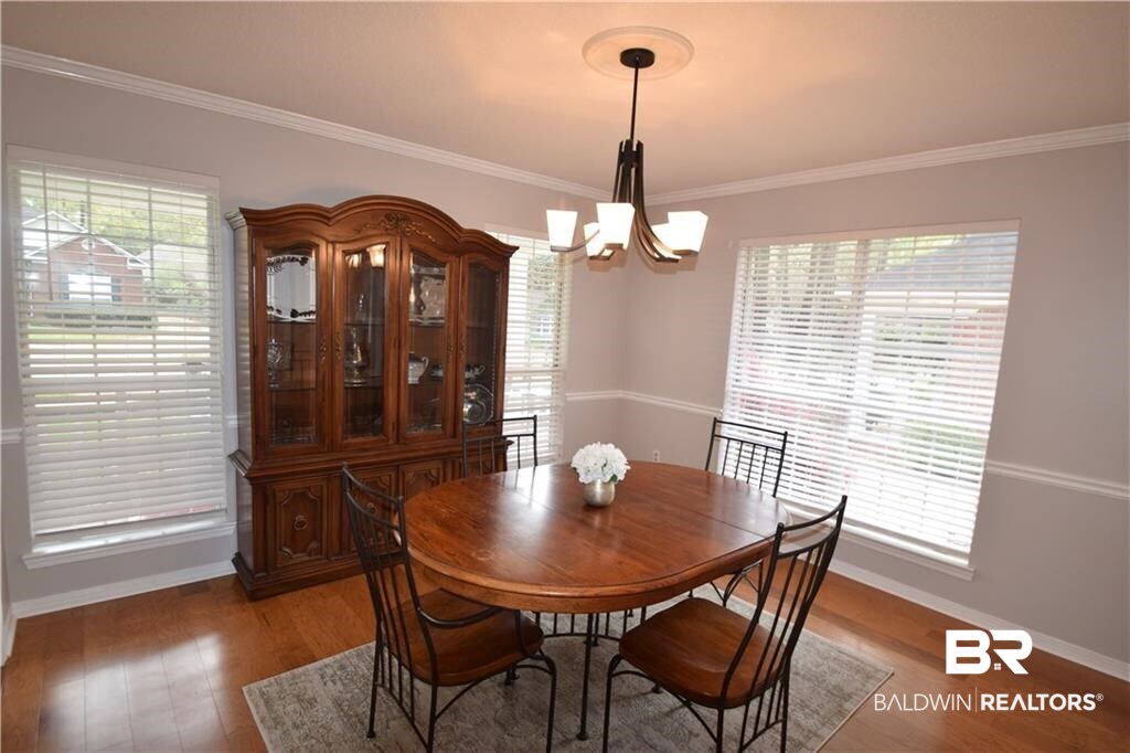 852 West Briar Court Mobile, AL 36609 - Photo 5 of 40 Formal dining room with new hardwood floors.