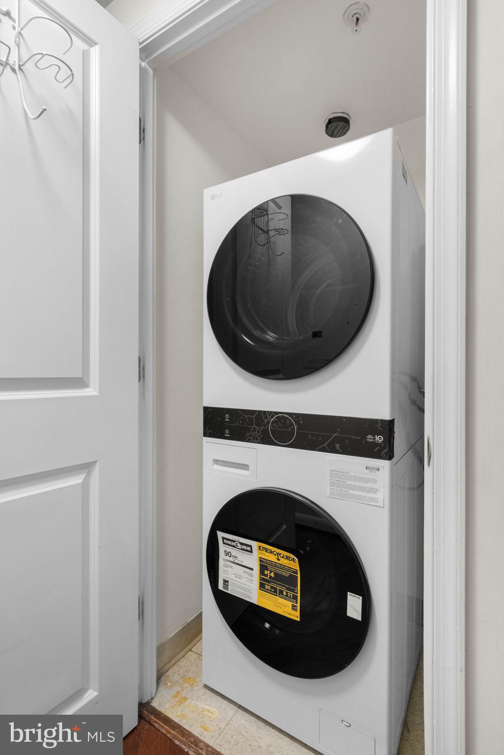 851 North Glebe Road, Unit 1011 Arlington, VA 22203 - Photo 8 of 41 a utility room with dryer and washer