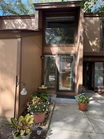 a front view of a house with outdoor space