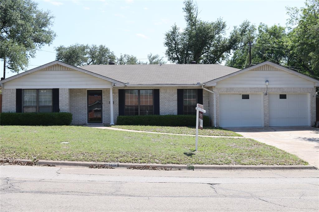 3205 Pin Oak Drive Temple, TX 76502 - Photo 1 of 30 a front view of a house with a yard and garage