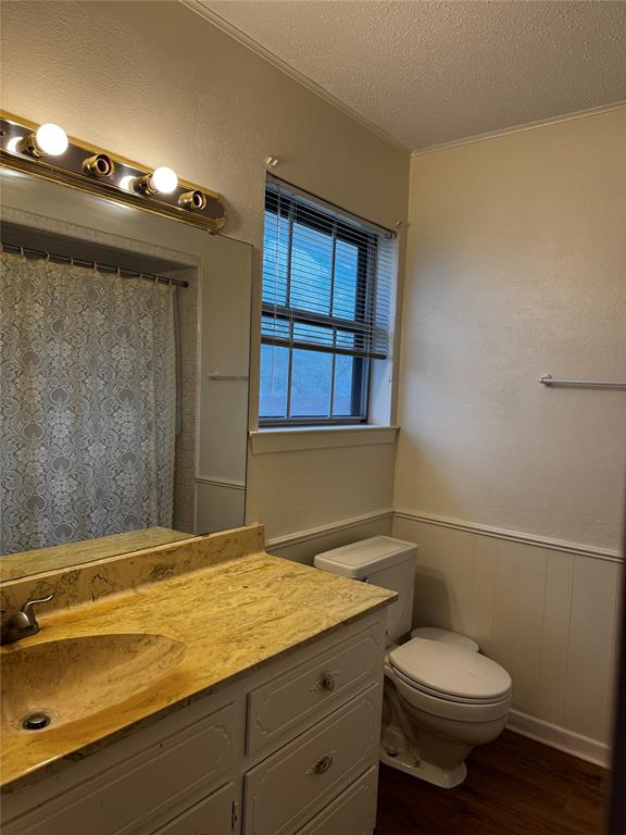 3205 Pin Oak Drive Temple, TX 76502 - Photo 19 of 30 a bathroom with a granite countertop sink toilet and shower
