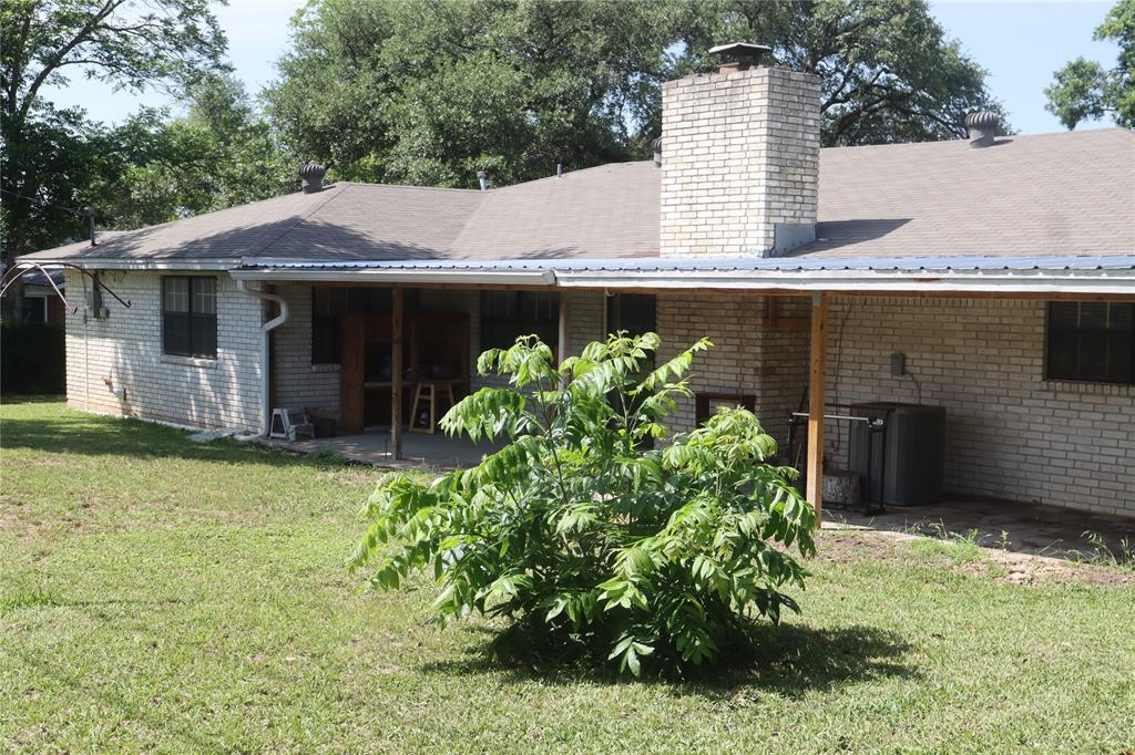 3205 Pin Oak Drive Temple, TX 76502 - Photo 28 of 30 a front view of a house with garden