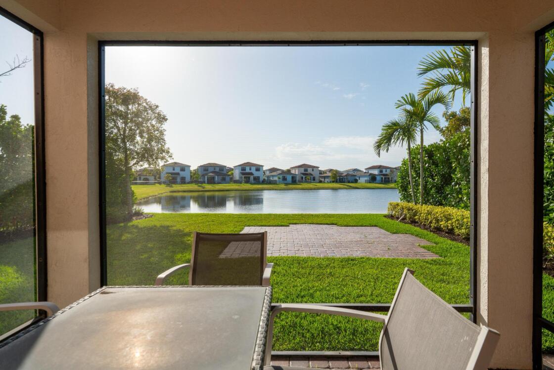 5556 Starfish Road The Acreage, FL 33470 - Photo 31 of 34 Screened Patio