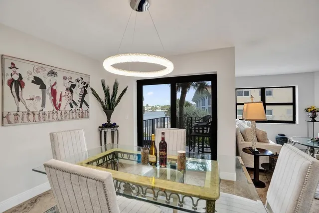 a view of a balcony with palm trees