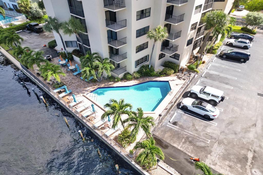 501 North Riverside Drive, Unit 203 Pompano Beach, FL 33062 - Photo 56 of 63 a view of swimming pool with outdoor seating