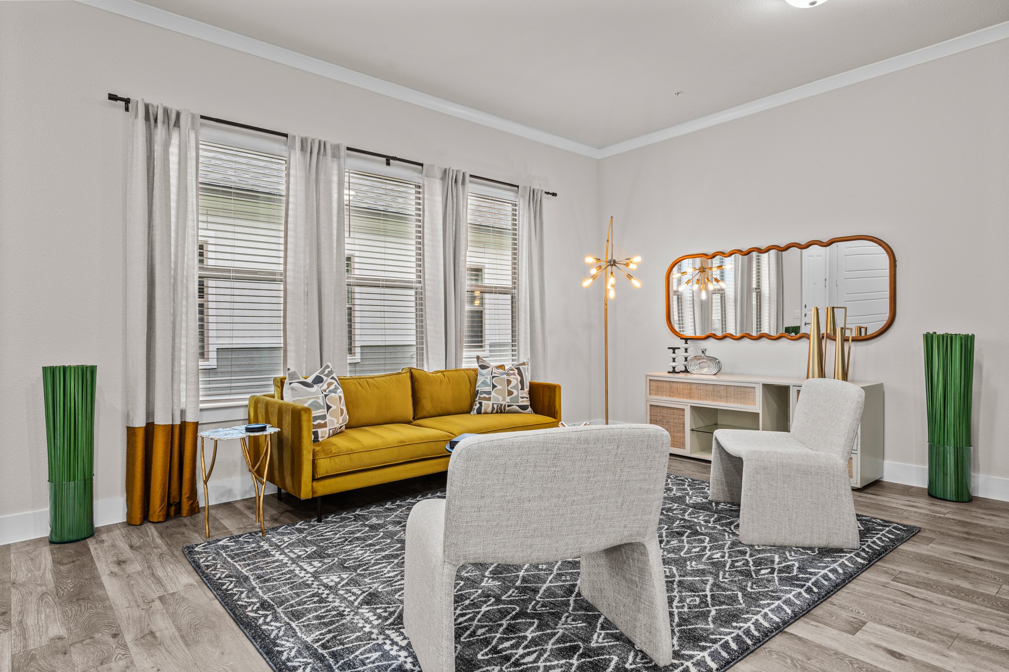 865 Limmer Loop, Unit 1105 Hutto, TX 78634 - Photo 3 of 32 a living room with furniture and a rug