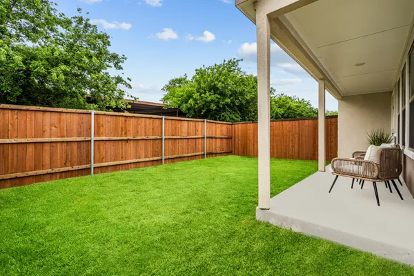 a view of backyard with green space