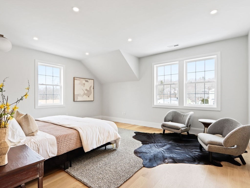 48 Valley View Road Waltham, MA 02452 - Photo 12 of 29 a bedroom with a bed a couch and a window