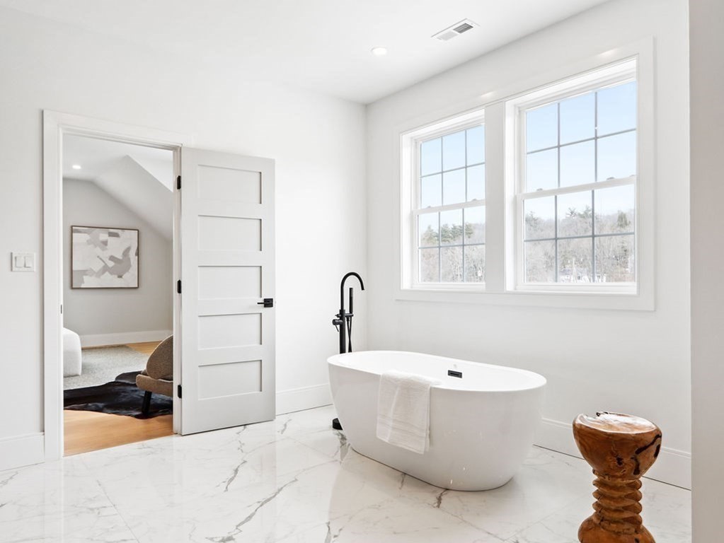 48 Valley View Road Waltham, MA 02452 - Photo 16 of 29 a bathroom with a bathtub and a sink