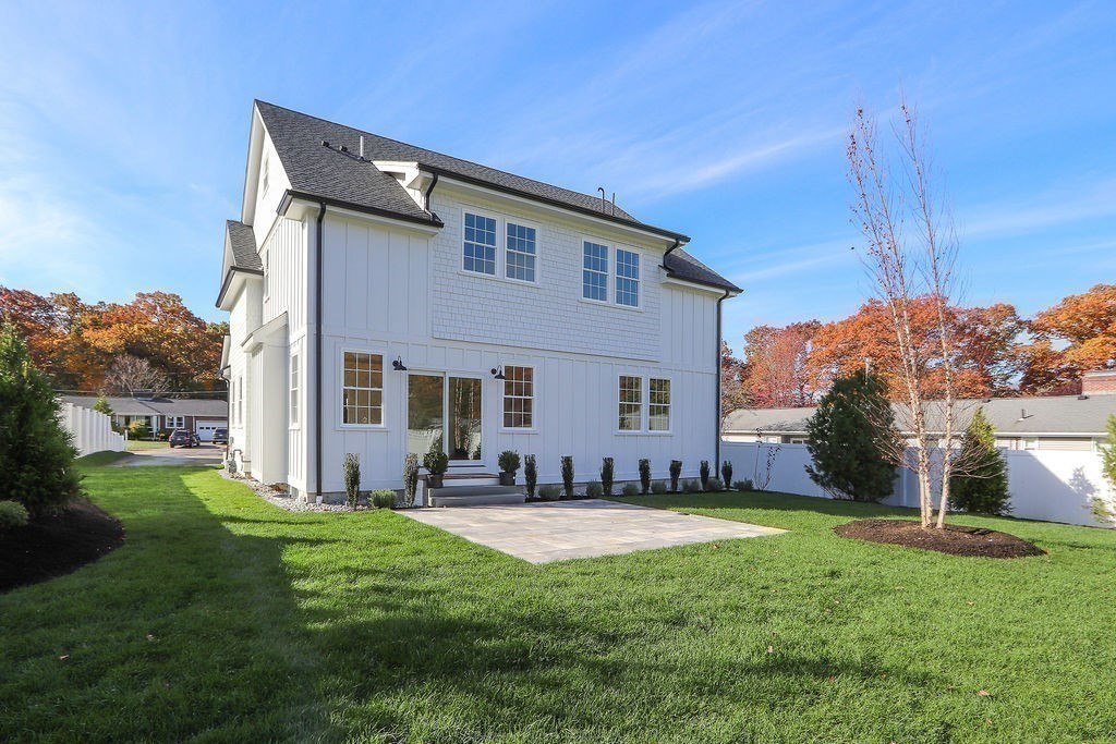 48 Valley View Road Waltham, MA 02452 - Photo 27 of 29 a view of a house with a yard