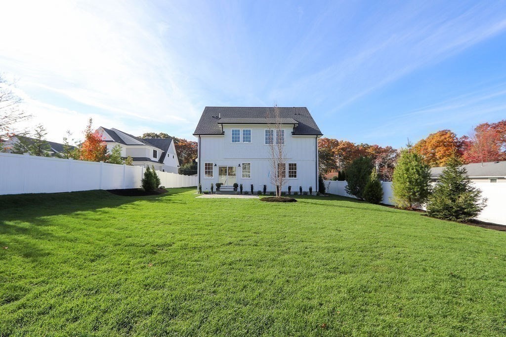 48 Valley View Road Waltham, MA 02452 - Photo 29 of 29 a house with a field