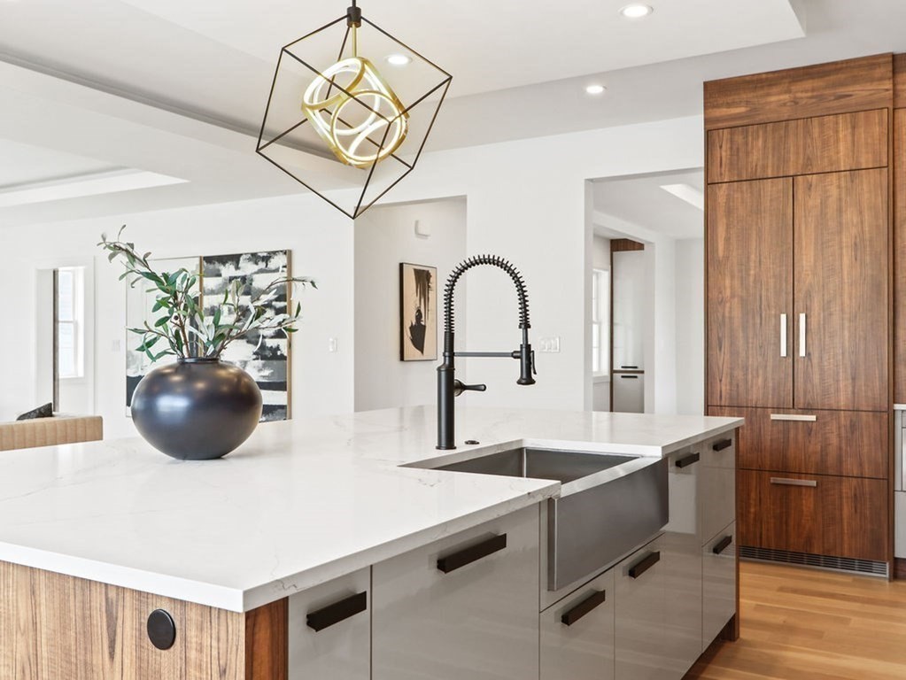 48 Valley View Road Waltham, MA 02452 - Photo 4 of 29 a view of a kitchen with a sink and living room