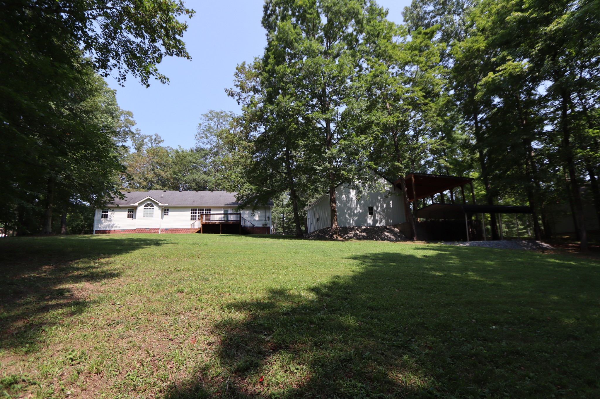 972 Williamson County Line Road Fairview, TN 37062 - Photo 45 of 68 a front view of a house with a yard and trees