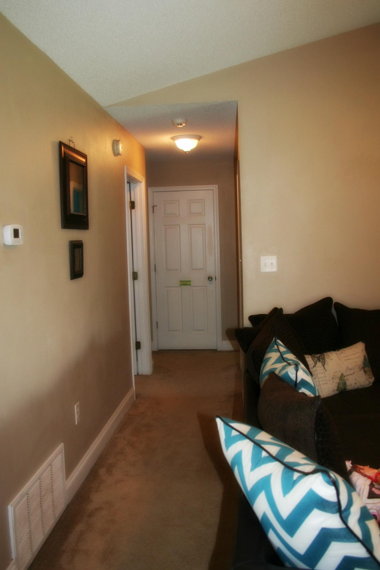 4888 Jennifer Lane Pace, FL 32571 - Photo 3 of 10 a view of a livingroom with furniture and an entryway