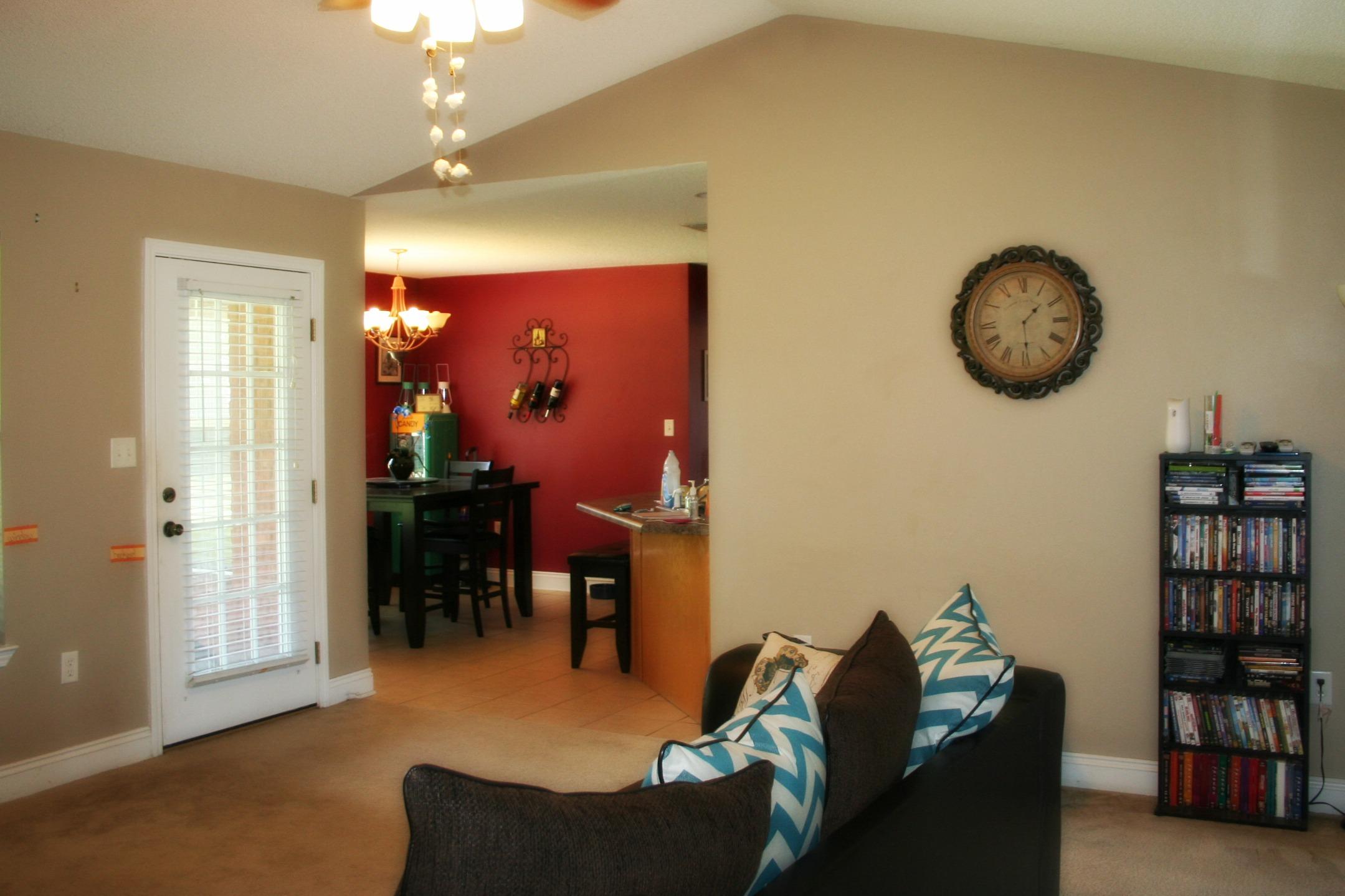 4888 Jennifer Lane Pace, FL 32571 - Photo 5 of 10 a living room with furniture and a window