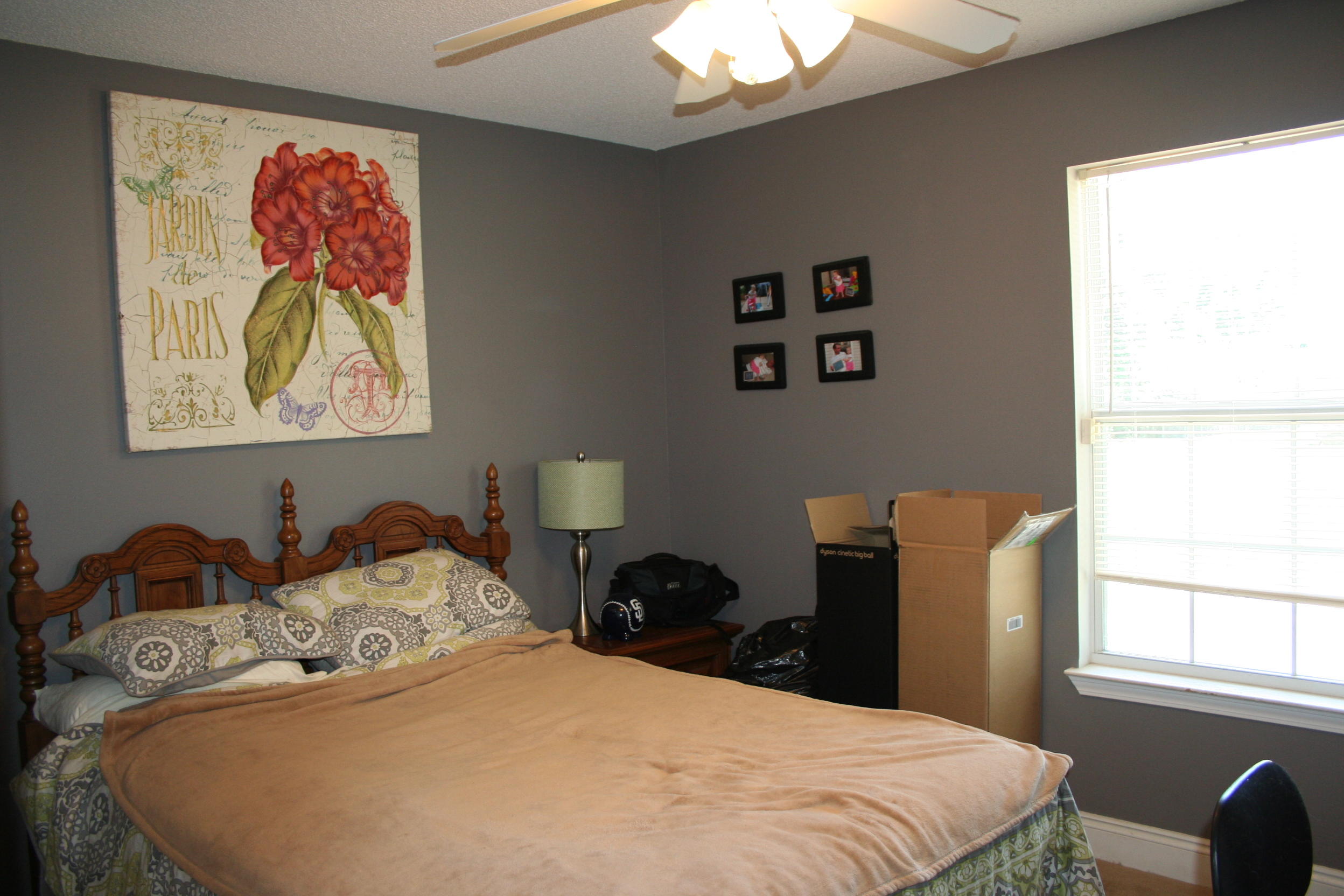 4888 Jennifer Lane Pace, FL 32571 - Photo 10 of 10 a bedroom with a bed and a window