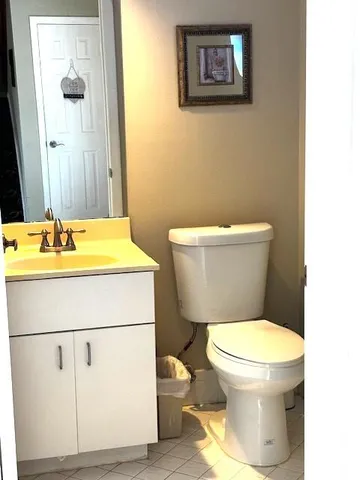a bathroom with a toilet and a sink